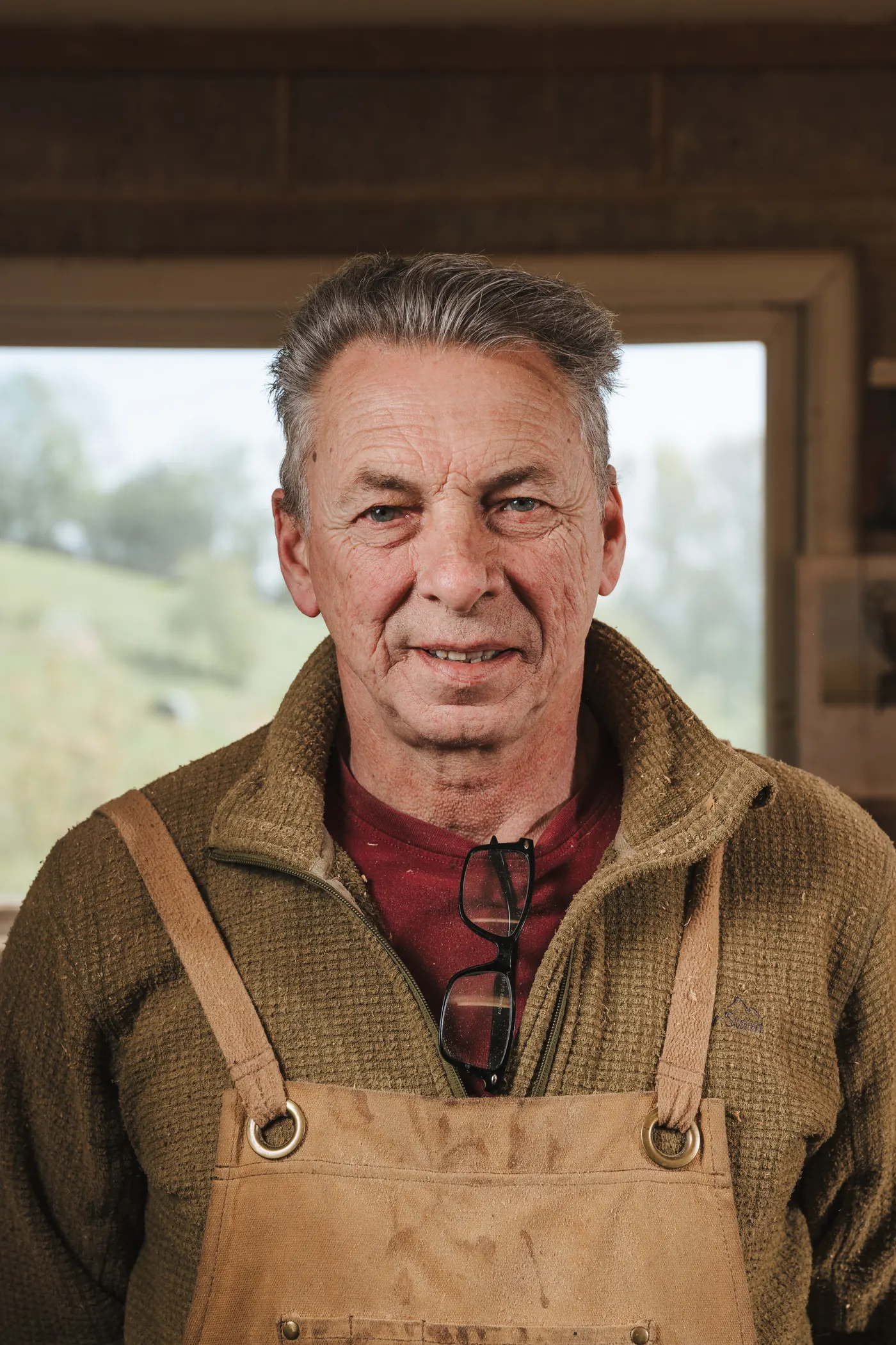 Andrew Clark, wood carver at Andrew Clark Carvings, in his workshop